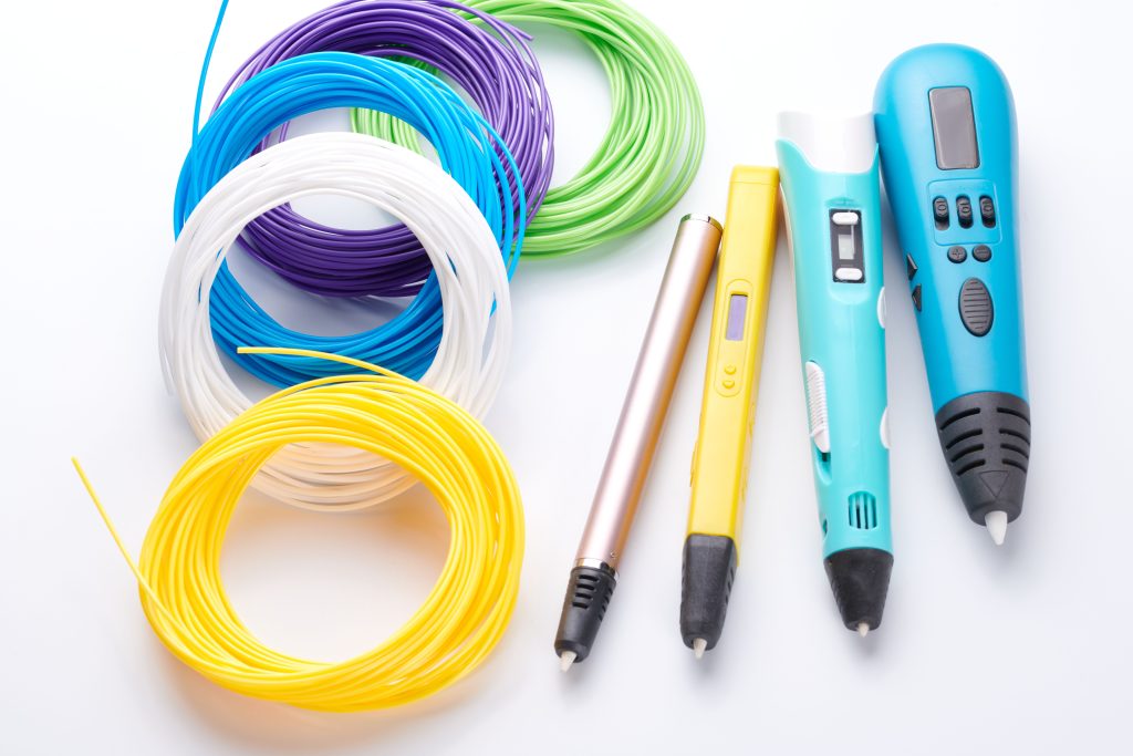 3d pen for creating volume plastic figures isolated on white background